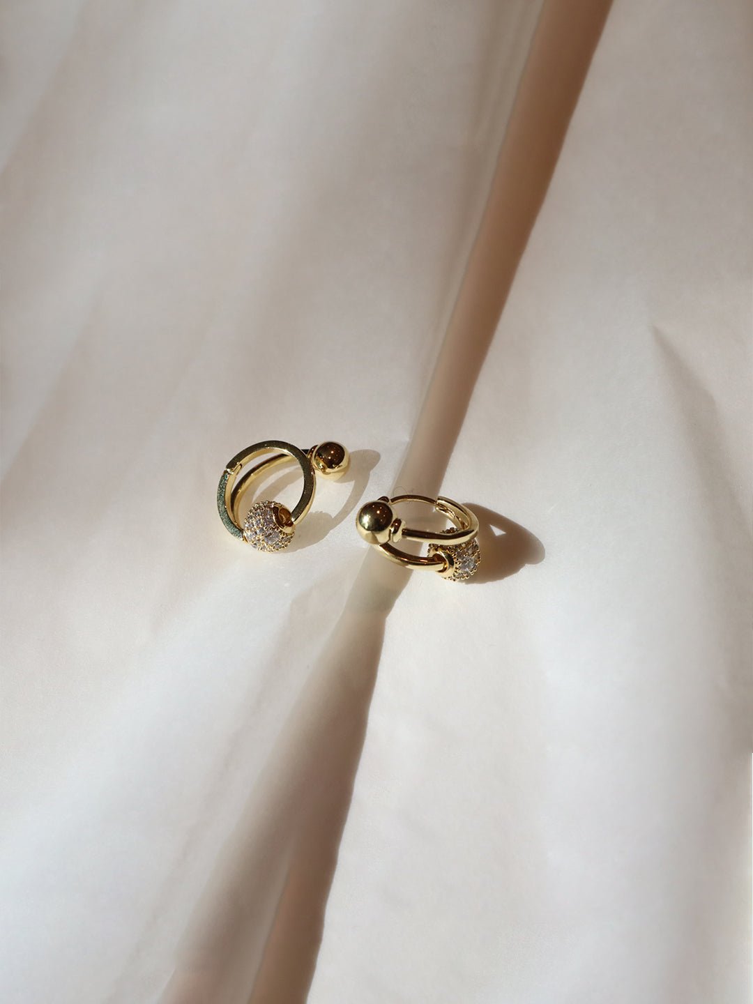 14K/White Gold Plated Lustrous Loop Earrings - Revermejewelry